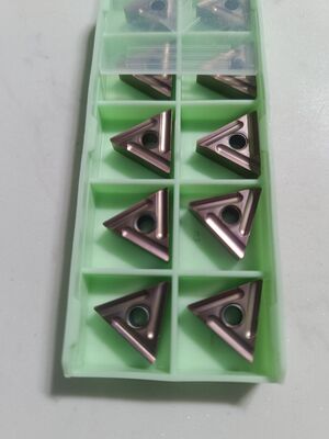 Sisipan Pembalik Pemotongan Cnc Karbida Tahan Lama TNMG160408 Direkayasa untuk Operasi Pemesinan Meningkatkan Produktivitas dan Umur Alat